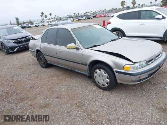 1991 Honda Accord LX z VIN JHMCB7655MC000372, wystawiony jako IAAI lot #42372597 z przebiegiem 153 129 mil mil oraz . Historia ofert i sprzedaży dostępna na DreamBid. Obrazek 1.