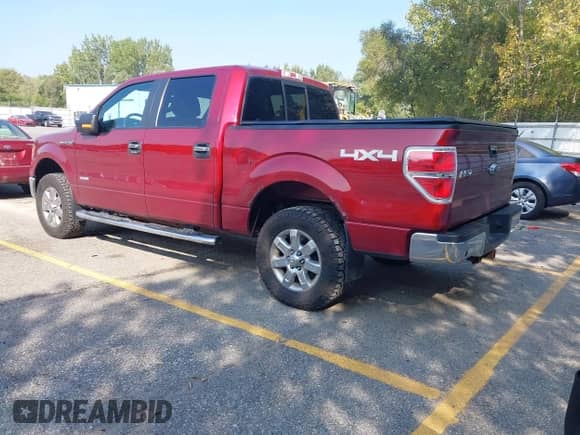 2013 Ford F-150 Lariat with VIN 1FTFW1ET5DKD04467, listed as a IAAI auction lot 43355676 with 124,871 mi miles and . Bid and sale history available at DreamBid. Image 3.