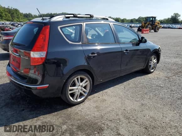 2012 Hyundai Elantra SE z VIN KMHDC8AE6CU129063, wystawiony jako Copart lot #66445825 z przebiegiem 193 979 mil mil oraz Szkoda całkowita • Salvage title. Historia ofert i sprzedaży dostępna na DreamBid. Obrazek 3.