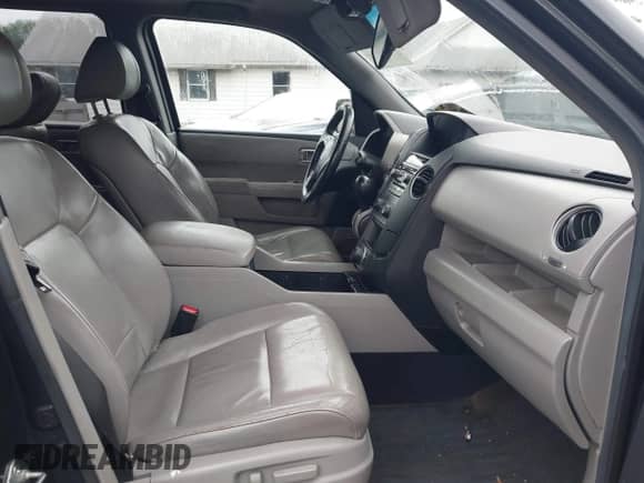 2013 Honda Pilot EX-L with VIN 5FNYF4H60DB040166, listed as a IAAI auction lot 42624940 with 216,462 mi miles and . Bid and sale history available at DreamBid. Image 5.