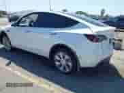 2023 Tesla Model Y Long Range z VIN 7SAYGDEE9PA081036, wystawiony jako IAAI lot #43151161 z przebiegiem 49 637 mil mil oraz . Historia ofert i sprzedaży dostępna na DreamBid. Obrazek 3.