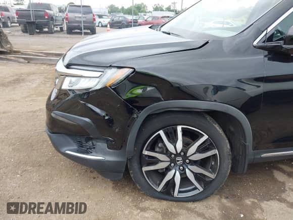 2021 Honda Pilot Elite z VIN 5FNYF6H00MB085972, wystawiony jako IAAI lot #43027676 z przebiegiem 48 133 mil mil oraz . Historia ofert i sprzedaży dostępna na DreamBid. Obrazek 6.