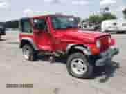 2000 Jeep Wrangler Sport z VIN 1J4FA49S6YP783339, wystawiony jako Copart lot #68548335 z przebiegiem 45 484 mil mil oraz Szkoda całkowita • Salvage title. Historia ofert i sprzedaży dostępna na DreamBid. Obrazek 4.