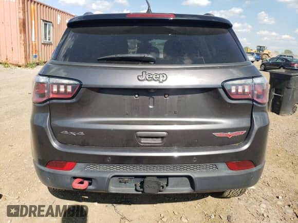 2017 Jeep Compass Trailhawk with VIN 3C4NJDDB5HT657784, listed as a Copart auction lot 63145835 with 82,022 mi miles and Salvage title. Bid and sale history available at DreamBid. Image 6.