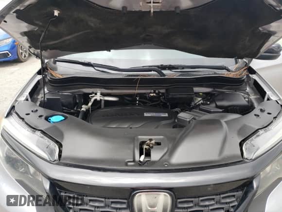 2019 Honda Passport Sport with VIN 5FNYF8H24KB015742, listed as a Copart auction lot 69545835 with 135,284 mi miles and Salvage title. Bid and sale history available at DreamBid. Image 12.
