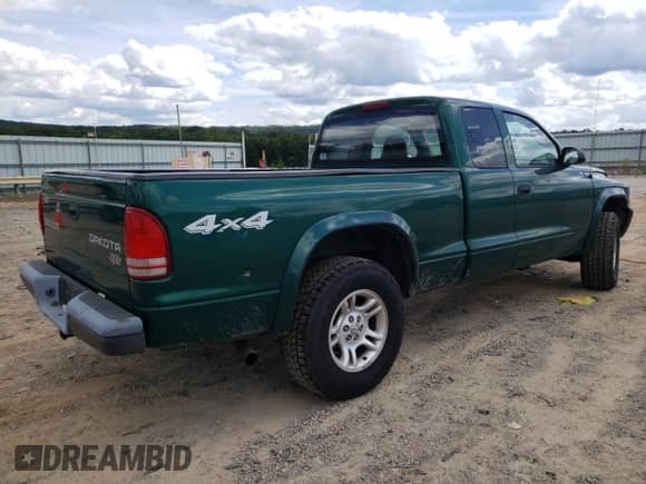 2003 Dodge Dakota с VIN 1D7HG12X33S231147, выставлен на аукционе Copart как лот 70668215 с пробегом 144 455 миль миль и Списание • Salvage title. История ставок и продаж доступна на DreamBid. Изображение 3.