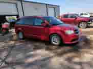 2013 Dodge Grand Caravan SXT with VIN 2C4RDGCGXDR633730, listed as a Copart auction lot 64557035 with 77,913 mi miles and Salvage title. Bid and sale history available at DreamBid. Image 14.