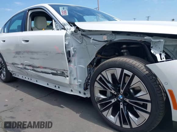 2024 BMW 5 Series 530i with VIN WBA43FJ06RCS61104, listed as a IAAI auction lot 43056084 with Not provided miles and . Bid and sale history available at DreamBid. Image 6.