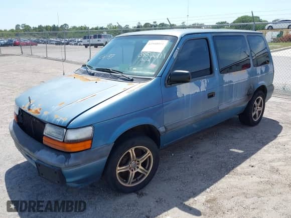 1994 Dodge Caravan with VIN 2B4GH25K4RR517492, listed as a IAAI auction lot 41940051 with 241,574 mi miles and . Bid and sale history available at DreamBid. Image 2.