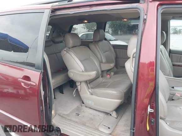 2005 Toyota Sienna XLE Limited z VIN 5TDZA22C15S281382, wystawiony jako IAAI lot #43300575 z przebiegiem 141 246 mil mil oraz . Historia ofert i sprzedaży dostępna na DreamBid. Obrazek 8.