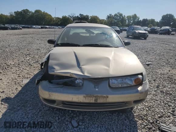 2002 Saturn SL с VIN 1G8ZH528X2Z115228, выставлен на аукционе Copart как лот 71235424 с пробегом 64 375 миль миль и Списание • Salvage title. История ставок и продаж доступна на DreamBid. Изображение 5.