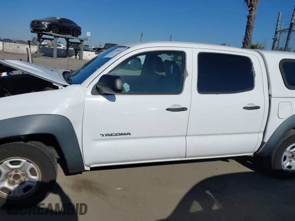 2012 Toyota Tacoma with VIN 5TFJX4CN4CX015403, listed as a IAAI auction lot 42266925 with 149,718 mi miles and . Bid and sale history available at DreamBid. Image 14.