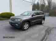 2014 Jeep Grand Cherokee Laredo z VIN 1C4RJFAG8EC163505, wystawiony jako Copart lot #54096315 z przebiegiem 223 525 mil mil oraz Czysty tytuł • Clean title. Historia ofert i sprzedaży dostępna na DreamBid. Obrazek 2.