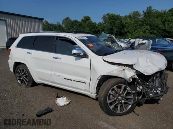 2018 Jeep Grand Cherokee Overland z VIN 1C4RJFCG2JC503559, wystawiony jako Copart lot #65679805 z przebiegiem Nie podano mil oraz Szkoda całkowita • Salvage title. Historia ofert i sprzedaży dostępna na DreamBid. Obrazek 4.