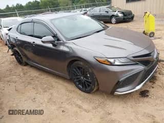2024 Toyota Camry Hybrid XSE with VIN 4T1K31AK3RU073094, listed as a IAAI auction lot 43025530 with 58,511 mi miles and . Bid and sale history available at DreamBid. Image 1.