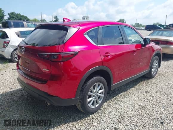 2023 Mazda CX-5 S Carbon Edition z VIN JM3KFBCM4P0239778, wystawiony jako IAAI lot #42856157 z przebiegiem 17 778 mil mil oraz . Historia ofert i sprzedaży dostępna na DreamBid. Obrazek 4.