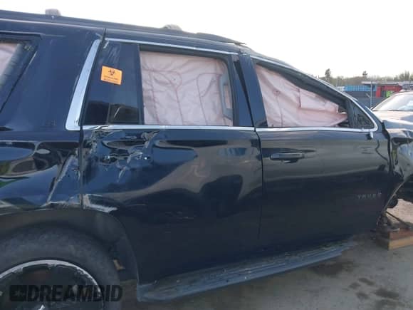 2016 Chevrolet Tahoe LS z VIN 1GNSKAKC3GR338618, wystawiony jako IAAI lot #41872018 z przebiegiem Nie podano mil oraz . Historia ofert i sprzedaży dostępna na DreamBid. Obrazek 14.