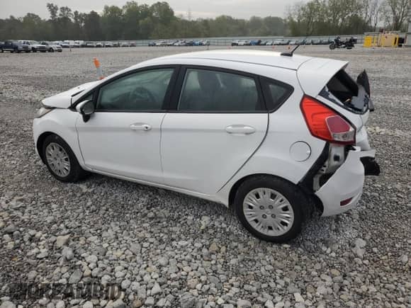 2015 Ford Fiesta S with VIN 3FADP4TJ4FM138743, listed as a Copart auction lot 83854505 with 124,556 mi miles and Salvage title. Bid and sale history available at DreamBid. Image 2.
