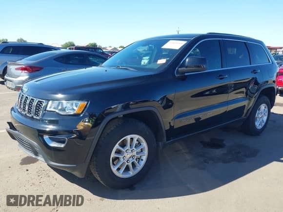 2018 Jeep Grand Cherokee Altitude z VIN 1C4RJEAG8JC311964, wystawiony jako IAAI lot #43469943 z przebiegiem 57 381 mil mil oraz . Historia ofert i sprzedaży dostępna na DreamBid. Obrazek 2.
