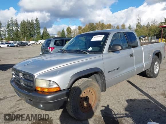 2002 Dodge Dakota z VIN 1B7GL12X42S708569, wystawiony jako IAAI lot #43535850 z przebiegiem 225 885 mil mil oraz . Historia ofert i sprzedaży dostępna na DreamBid. Obrazek 2.