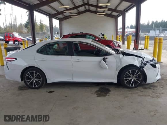 2019 Toyota Camry SE z VIN 4T1B11HK3KU847698, wystawiony jako IAAI lot #43421686 z przebiegiem 108 989 mil mil oraz . Historia ofert i sprzedaży dostępna na DreamBid. Obrazek 13.