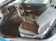 2017 Ford Mustang V6 with VIN 1FATP8EM0H5219810, listed as a Copart auction lot 81648235 with 94,269 mi miles and Salvage title. Bid and sale history available at DreamBid. Image 7.