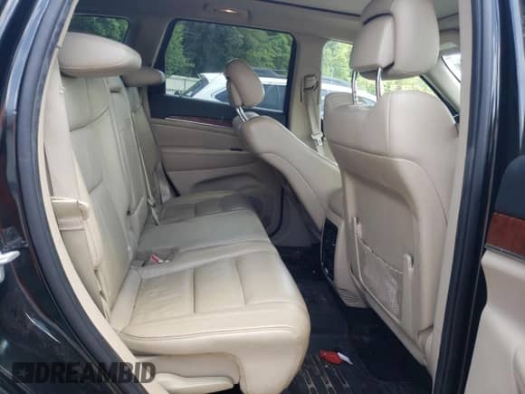 2012 Jeep Grand Cherokee Limited z VIN 1C4RJFBT3CC200226, wystawiony jako Copart lot #63813015 z przebiegiem 106 578 mil mil oraz Szkoda całkowita • Salvage title. Historia ofert i sprzedaży dostępna na DreamBid. Obrazek 11.
