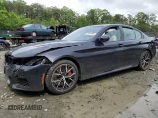 2023 BMW 5 Series 540i xDrive with VIN WBA73BJ03PCM01578, listed as a Copart auction lot 55609985 with 26,021 mi miles and Salvage title. Bid and sale history available at DreamBid. Image 1.