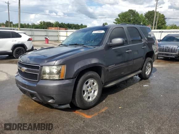 2010 Chevrolet Tahoe LS with VIN 1GNMCAE30AR224049, listed as a Copart auction lot 67772955 with 209,148 mi miles and Salvage title. Bid and sale history available at DreamBid. Image 1.