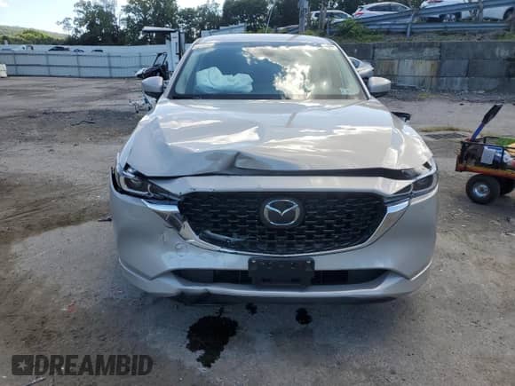 2024 Mazda CX-5 S Select z VIN JM3KFBBM5R0374322, wystawiony jako Copart lot #71842035 z przebiegiem 16 952 mil mil oraz Szkoda całkowita • Salvage title. Historia ofert i sprzedaży dostępna na DreamBid. Obrazek 5.