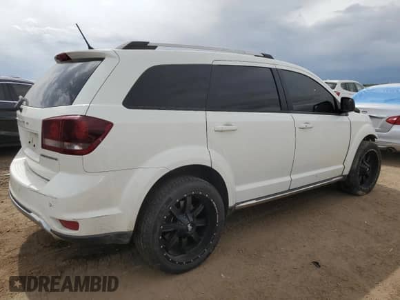 2017 Dodge Journey Crossroad Plus with VIN 3C4PDDGG6HT600288, listed as a Copart auction lot 80640215 with 103,942 mi miles and Salvage title. Bid and sale history available at DreamBid. Image 3.