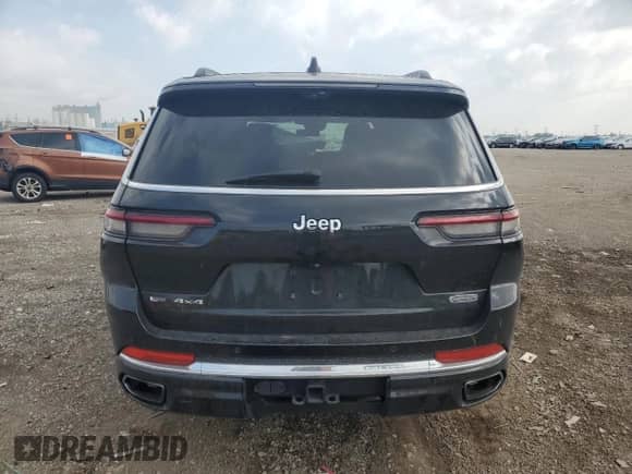 2021 Jeep Grand Cherokee Overland with VIN 1C4RJKDG5M8120374, listed as a Copart auction lot 65971065 with 49,517 mi miles and Salvage title. Bid and sale history available at DreamBid. Image 6.