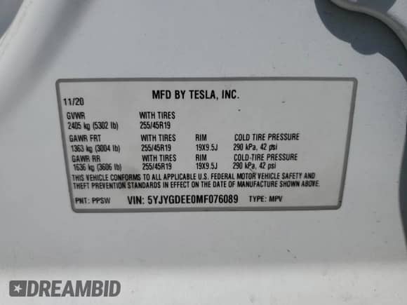 2021 Tesla Model Y Long Range with VIN 5YJYGDEE0MF076089, listed as a Copart auction lot 69102145 with 52,244 mi miles and Salvage title. Bid and sale history available at DreamBid. Image 14.