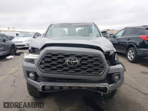 2021 Toyota Tacoma SR5 with VIN 3TMAZ5CN8MM140976, listed as a IAAI auction lot 41513243 with 109,786 mi miles and . Bid and sale history available at DreamBid. Image 13.
