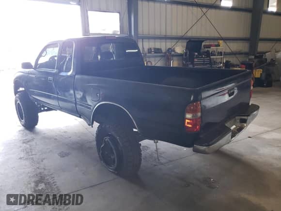 1997 Toyota Tacoma z VIN 4TAWN72N8VZ275224, wystawiony jako Copart lot #53267355 z przebiegiem 258 016 mil mil oraz Szkoda całkowita • Salvage title. Historia ofert i sprzedaży dostępna na DreamBid. Obrazek 2.