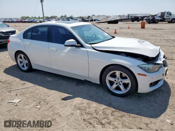 2015 BMW 3 Series 328i with VIN WBA3A5G55FNP34960, listed as a Copart auction lot 80057755 with 147,249 mi miles and Salvage title. Bid and sale history available at DreamBid. Image 4.