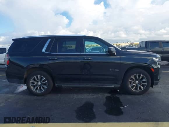 2021 Chevrolet Tahoe LT z VIN 1GNSCNKD2MR443255, wystawiony jako IAAI lot #43364345 z przebiegiem 133 418 mil mil oraz . Historia ofert i sprzedaży dostępna na DreamBid. Obrazek 14.