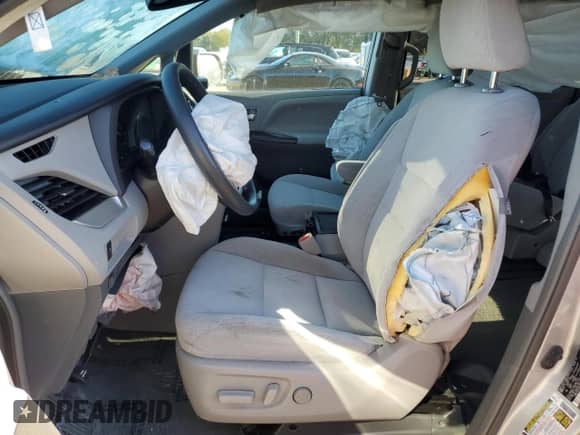 2016 Toyota Sienna LE with VIN 5TDKK3DC8GS694047, listed as a Copart auction lot 82324965 with Not provided miles and Salvage title. Bid and sale history available at DreamBid. Image 7.