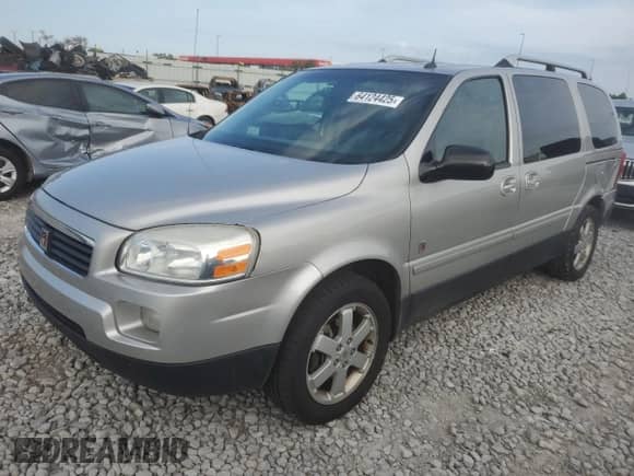 2005 Saturn Relay 3 AWD with VIN 5GZDX23L25D197167, listed as a Copart auction lot 64124425 with 203,497 mi miles and Salvage title. Bid and sale history available at DreamBid. Image 1.