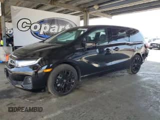 2025 Honda Odyssey Sport-L z VIN 5FNRL6H73SB073824, wystawiony jako Copart lot #70314505 z przebiegiem 6 214 mil mil oraz Szkoda całkowita • Salvage title. Historia ofert i sprzedaży dostępna na DreamBid. Obrazek 1.