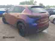 2022 Mazda CX-5 S Carbon Edition with VIN JM3KFBCM0N1584457, listed as a IAAI auction lot 42743636 with 27,287 mi miles and . Bid and sale history available at DreamBid. Image 3.