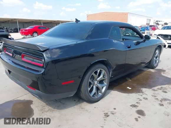 2016 Dodge Challenger SXT with VIN 2C3CDZAG1GH329771, listed as a IAAI auction lot 43219997 with 84,104 mi miles and . Bid and sale history available at DreamBid. Image 4.