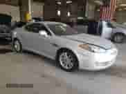 2007 Hyundai Tiburon GS with VIN KMHHM66D37U253610, listed as a Copart auction lot 62200825 with 107,500 mi miles and Salvage title. Bid and sale history available at DreamBid. Image 4.