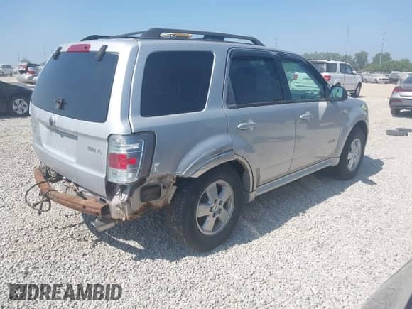 2008 Mercury Mariner with VIN 4M2CU91128KJ12970, listed as a IAAI auction lot 42940612 with 201,682 mi miles and . Bid and sale history available at DreamBid. Image 4.