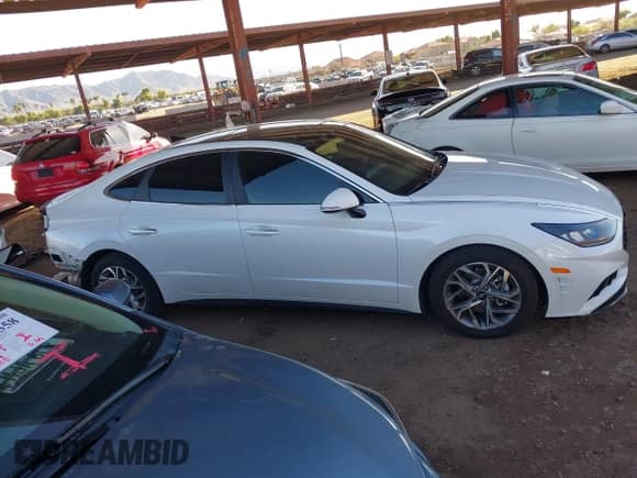 2020 Hyundai Sonata SEL z VIN 5NPEF4JA7LH015766, wystawiony jako IAAI lot #43431835 z przebiegiem 75 453 mil mil oraz . Historia ofert i sprzedaży dostępna na DreamBid. Obrazek 14.