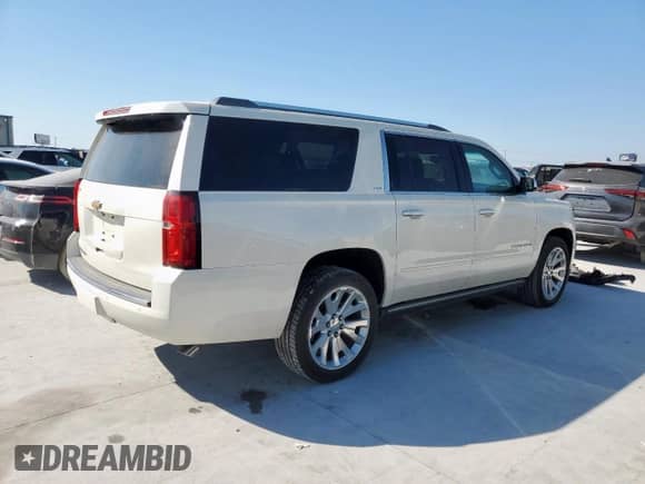 2015 Chevrolet Suburban LTZ с VIN 1GNSKKKCXFR162722, выставлен на аукционе Copart как лот 82402645 с пробегом 127 137 миль миль и Чистый • Clean title. История ставок и продаж доступна на DreamBid. Изображение 3.