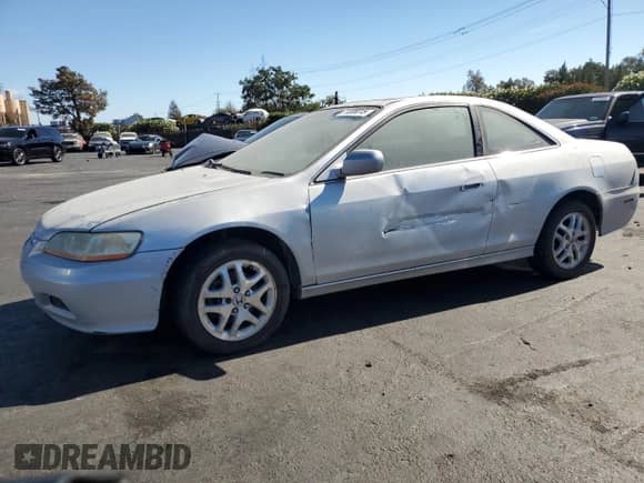 2002 Honda Accord EX with VIN 1HGCG22572A023495, listed as a Copart auction lot 71308015 with 177,408 mi miles and Salvage title. Bid and sale history available at DreamBid. Image 1.