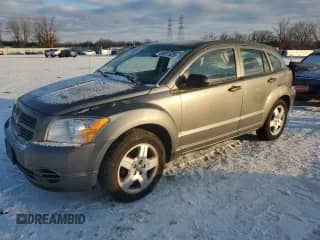 2011 Dodge Caliber with VIN 1B3CB1HA6BD262449, listed as a Copart auction lot 88331525 with 83,456 mi miles and Salvage title. Bid and sale history available at DreamBid. Image 1.