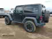 2013 Jeep Wrangler Rubicon 10th Anniversary with VIN 1C4BJWCG7DL677164, listed as a Copart auction lot 59992505 with 120,000 mi miles and Salvage title. Bid and sale history available at DreamBid. Image 2.