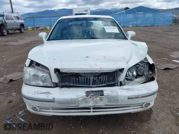 2005 Hyundai XG z VIN KMHFU45E85A418734, wystawiony jako IAAI lot #42312182 z przebiegiem 211 464 mil mil oraz . Historia ofert i sprzedaży dostępna na DreamBid. Obrazek 12.